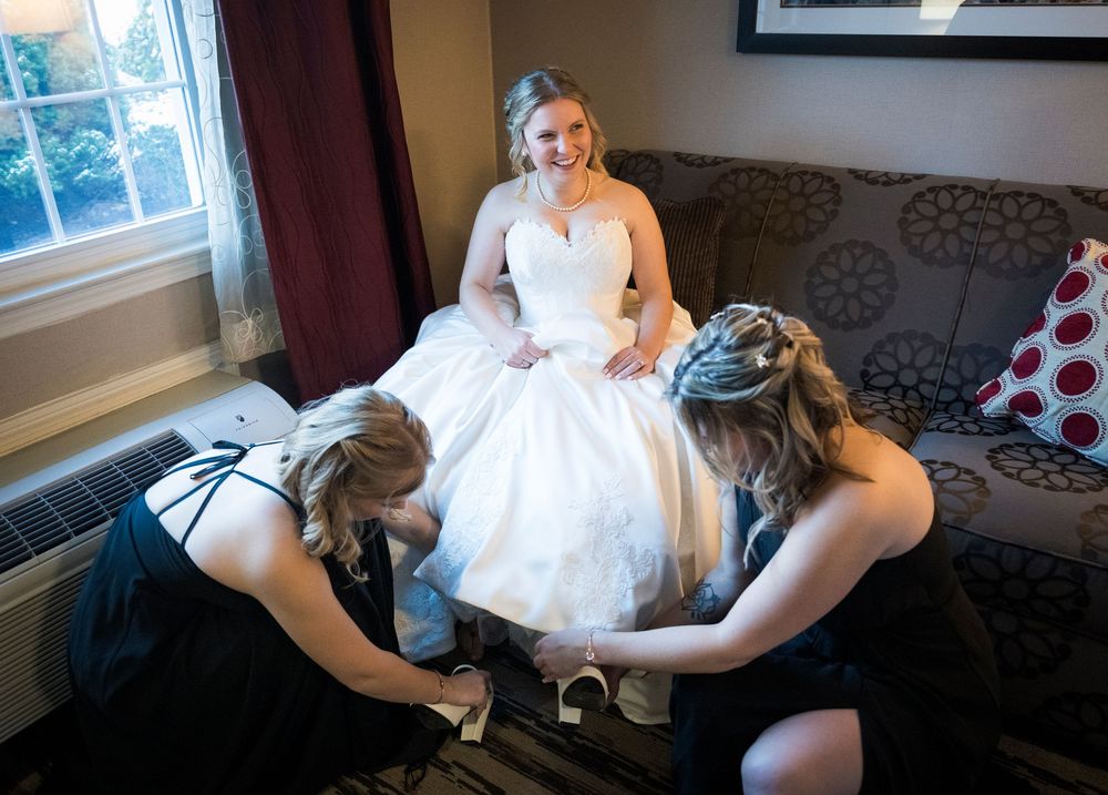 Wedding preparation sequence showing bride getting ready in sunlit room with couch.