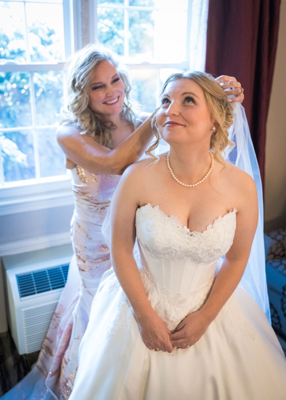 A sequence showing joyful moments as a bride in a white ballgown prepares for her wedding day.