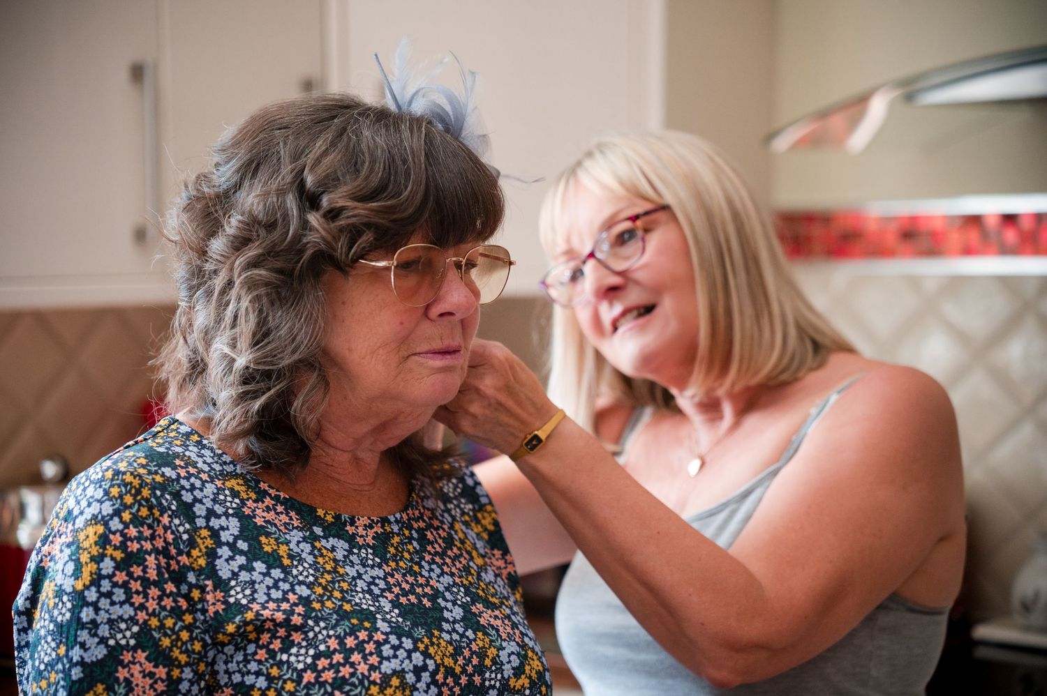 A touching series of candid moments between a grandmother and grandchild sharing laughter and affection at home.