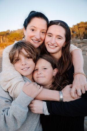 A series of candid close-up shots showing warm embraces and joyful moments outdoors during golden hour.