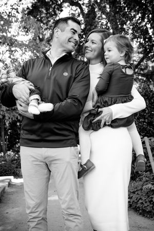 Series of candid outdoor family photos showing affectionate embraces and joyful interactions.