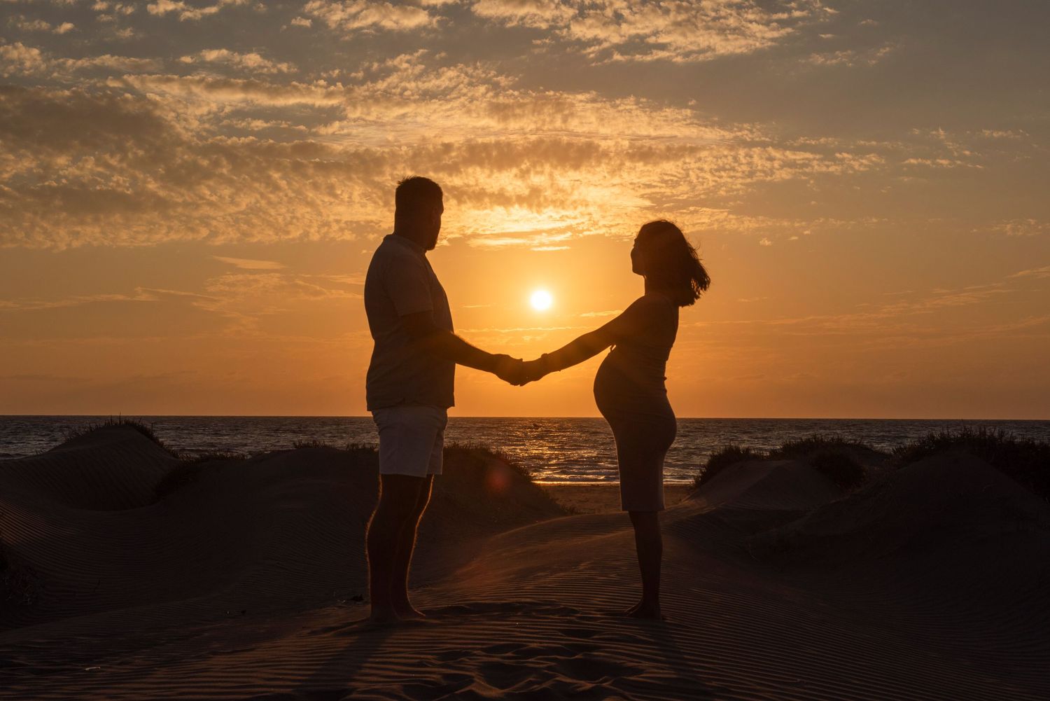 Maturnity beach shoot during sunset in Cyprus.