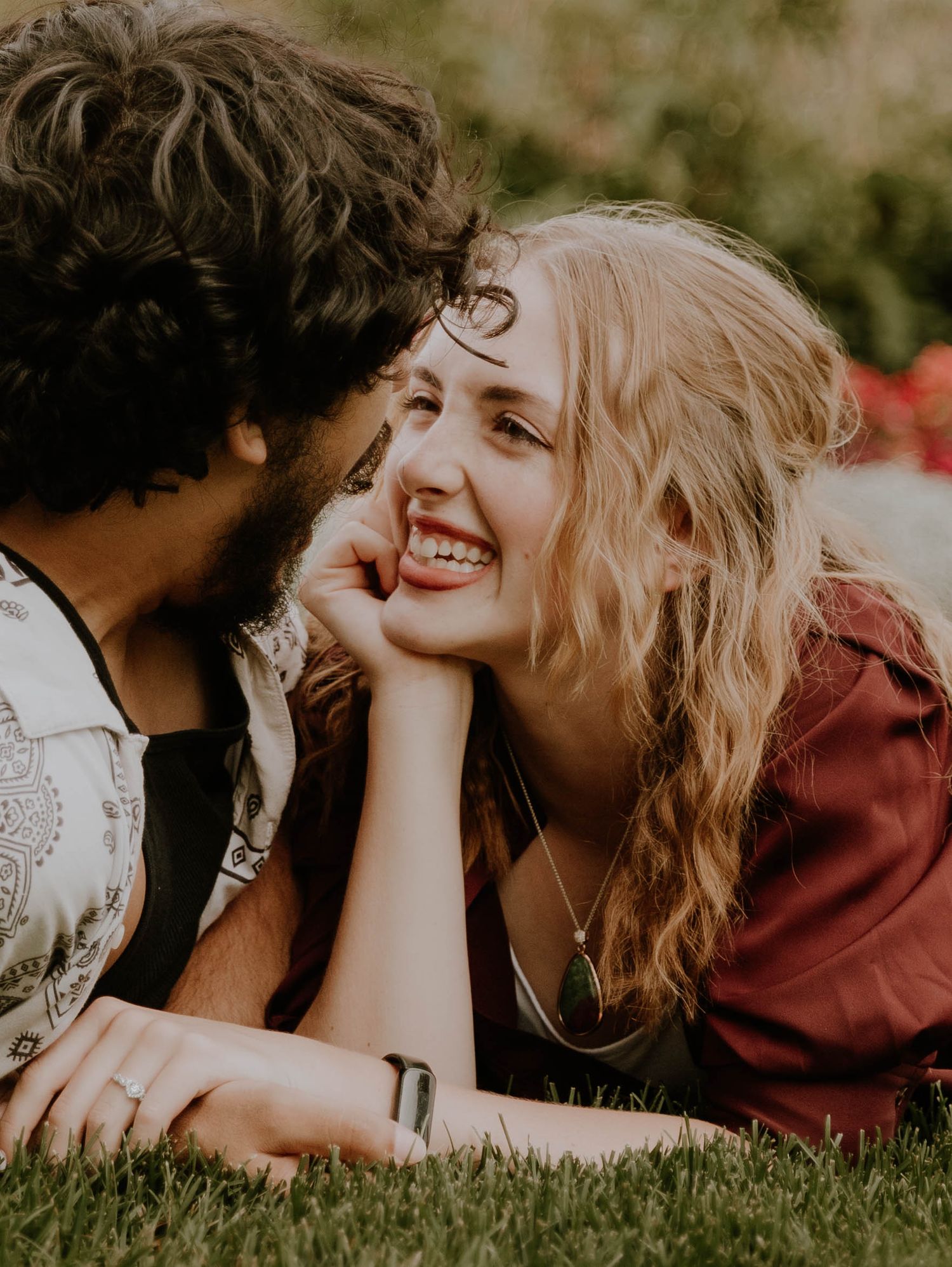 Couples laughs at each other for candid couples, engagement photos, elopement, and cinematic photos in Denver, Colorado from photographer