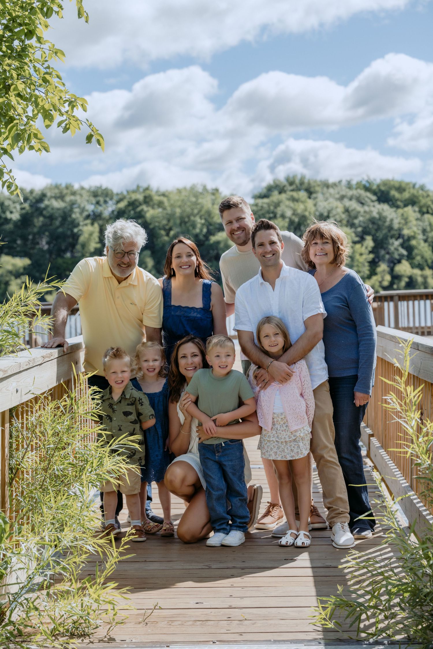 multi generational portrait of entire extended family on the docks at powers lake park in woodbury mn