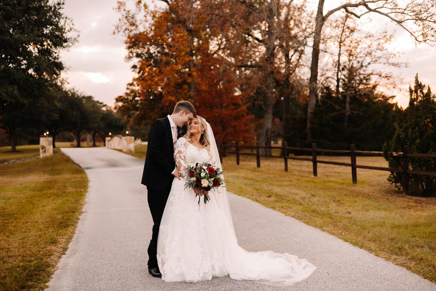 Bride & groom sharing a moment during their Houston wedding ceremony. Warm, romantic wedding photographer blends posed and candid photos,