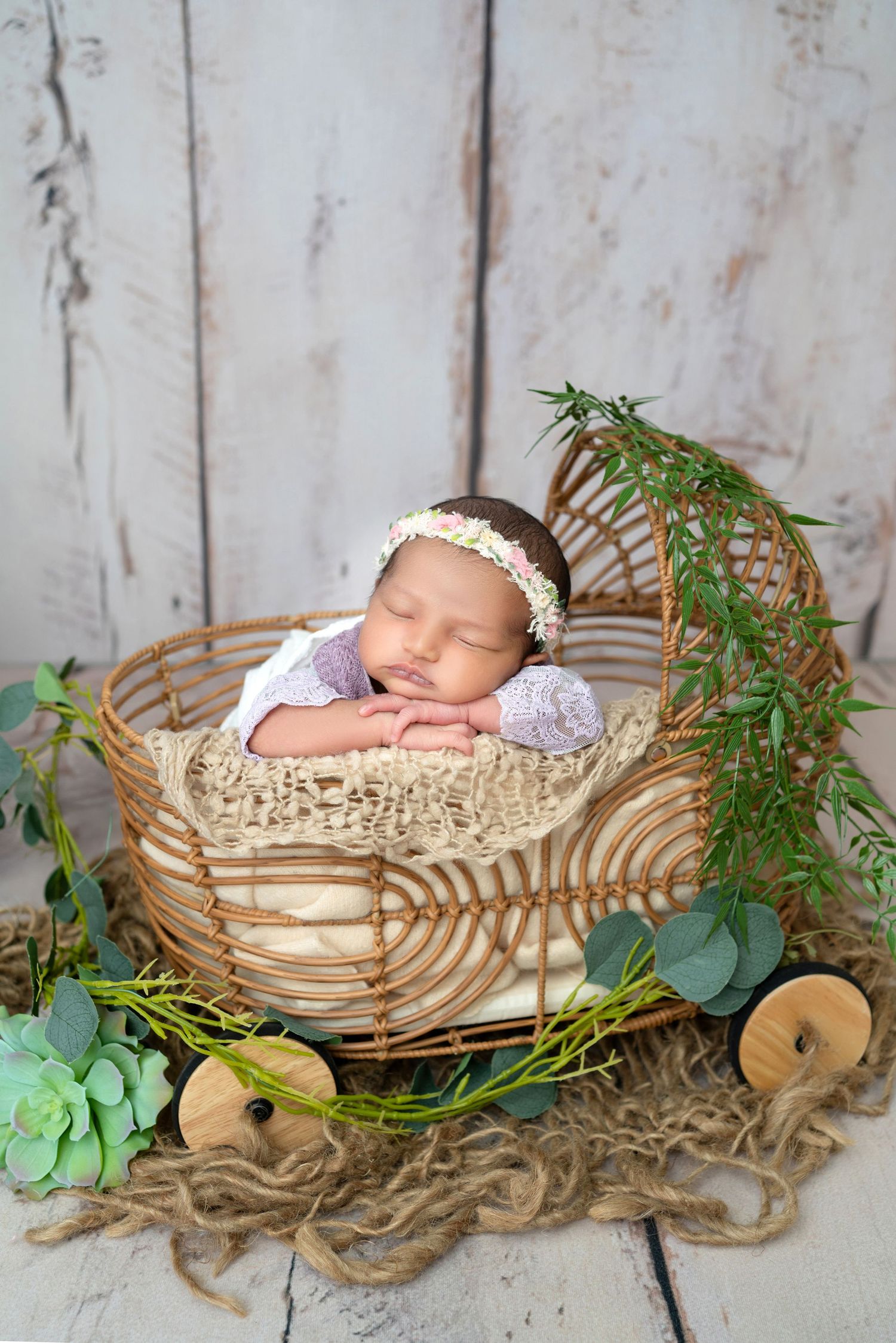 Newborn photography Melbourne, baby sleeping in wooden bed prop