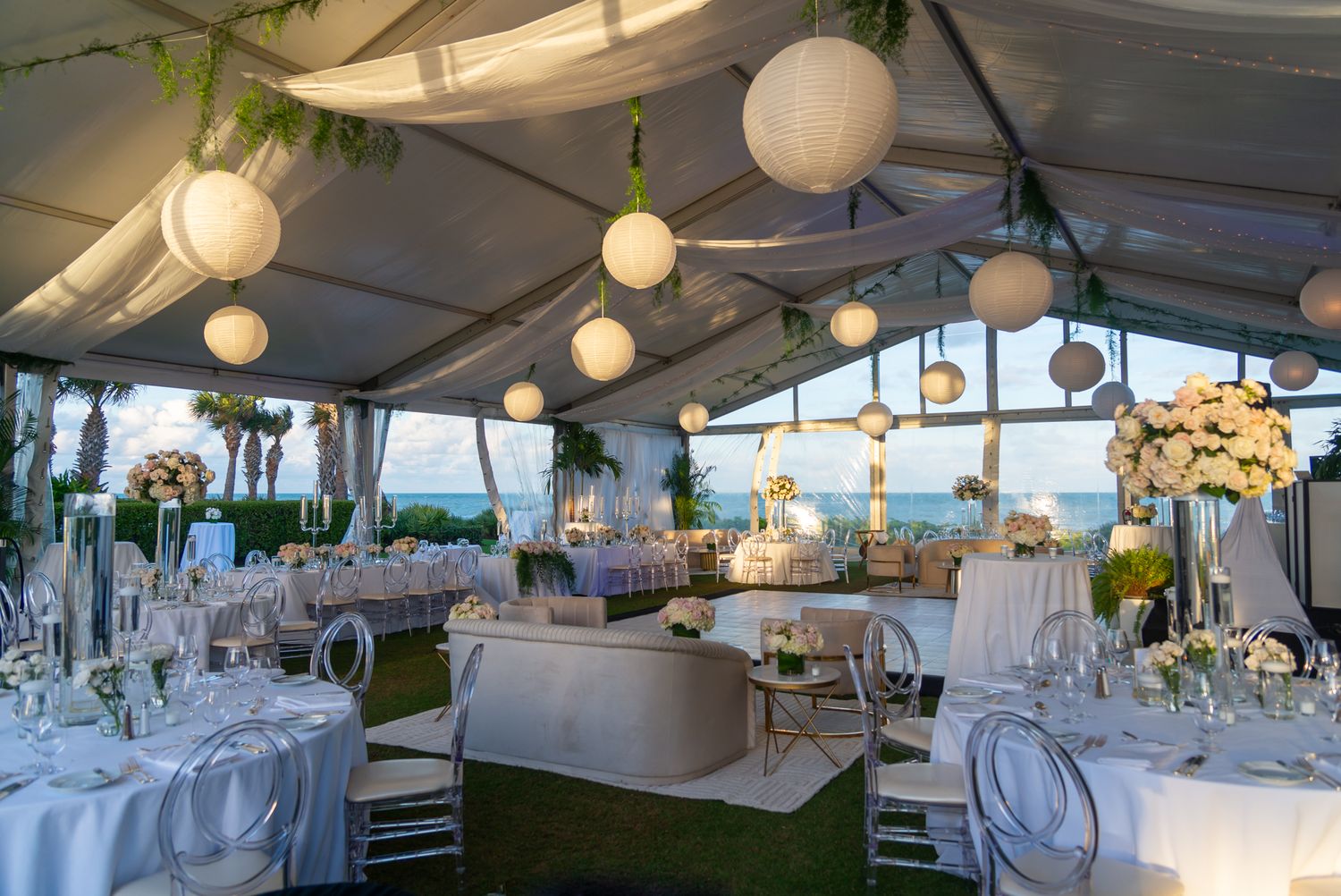 An elaborate reception area under a tent near the Atlantic Ocean on the Treasure Coast.