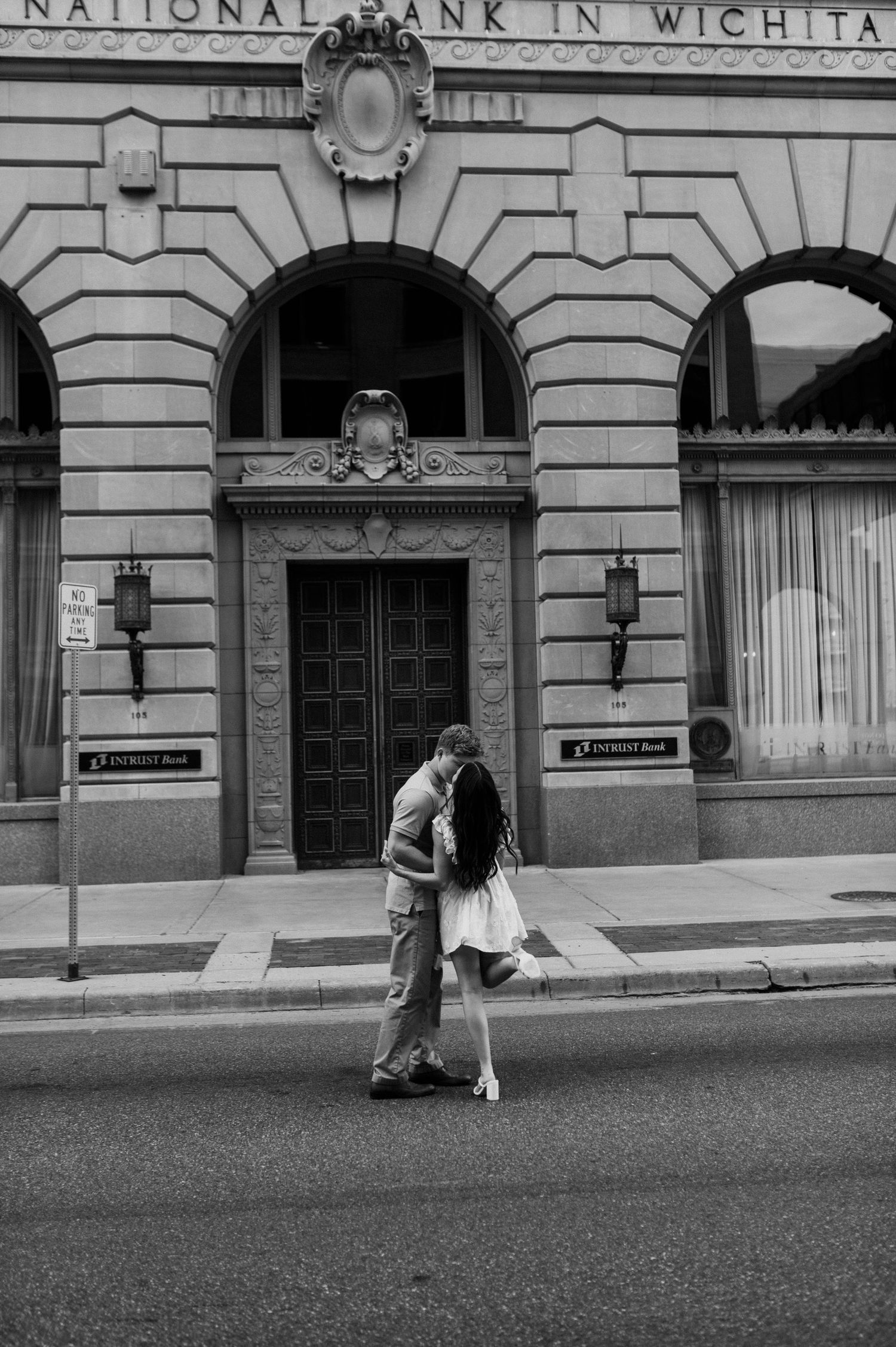 Downtown Wichita, KS engagement session by photographer Jessica Nadine Photography. Fancy classic architecture buildings city vibe