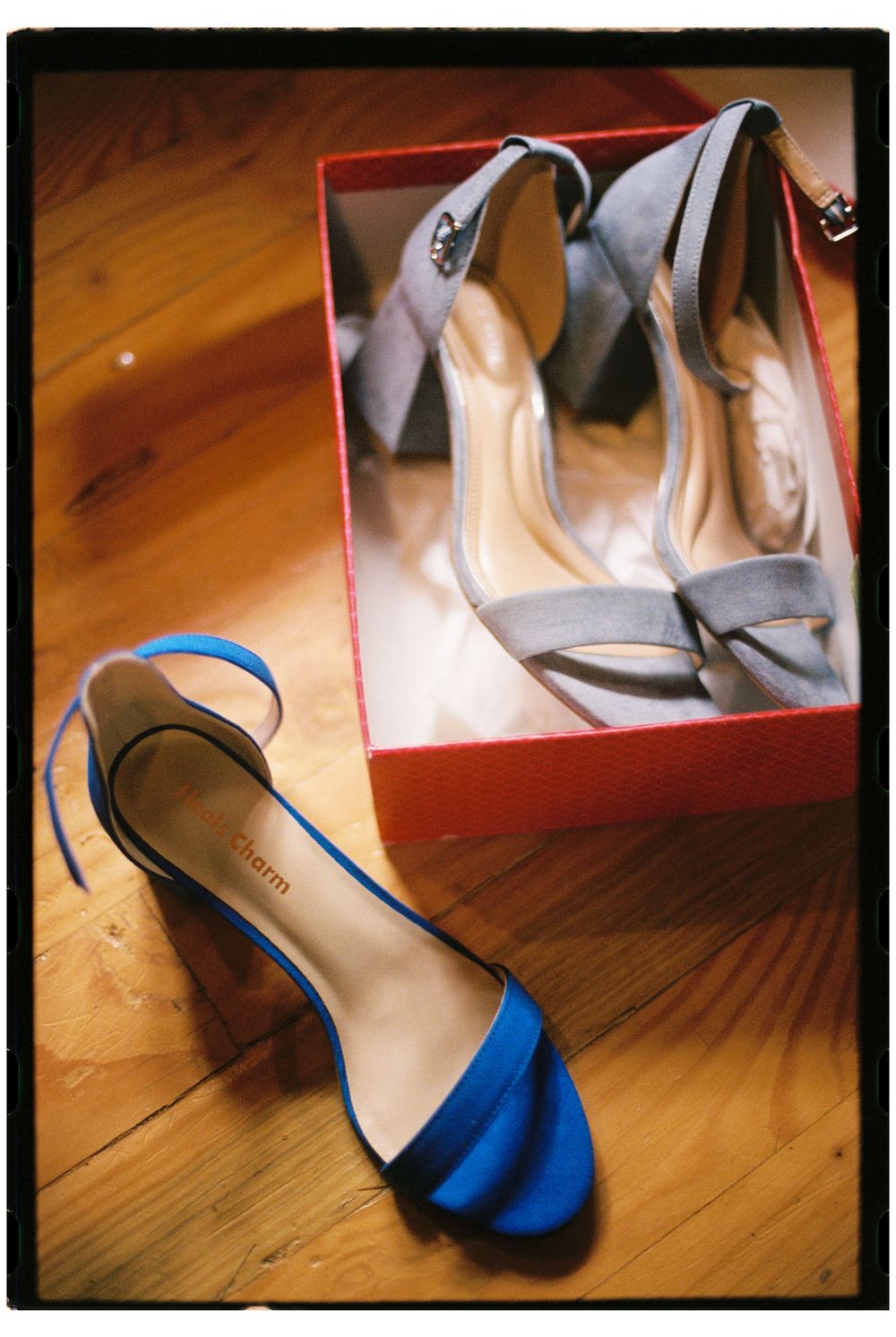 Detail of the brides blue heels, one light blue & one royal blue pair. One for the ceremony and one for the reception at a wedding in Maine.