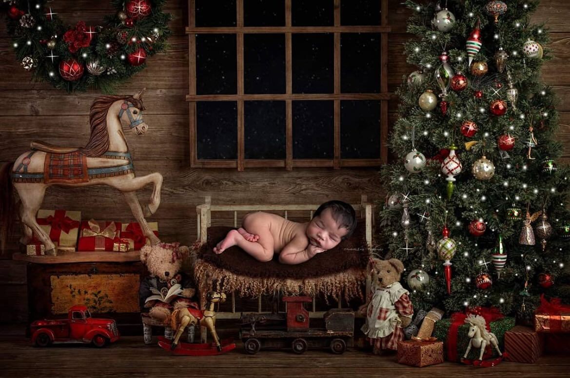 Cozy Christmas scene with decorated trees, wooden walls, vintage decor, and presents arranged in rustic holiday setting.