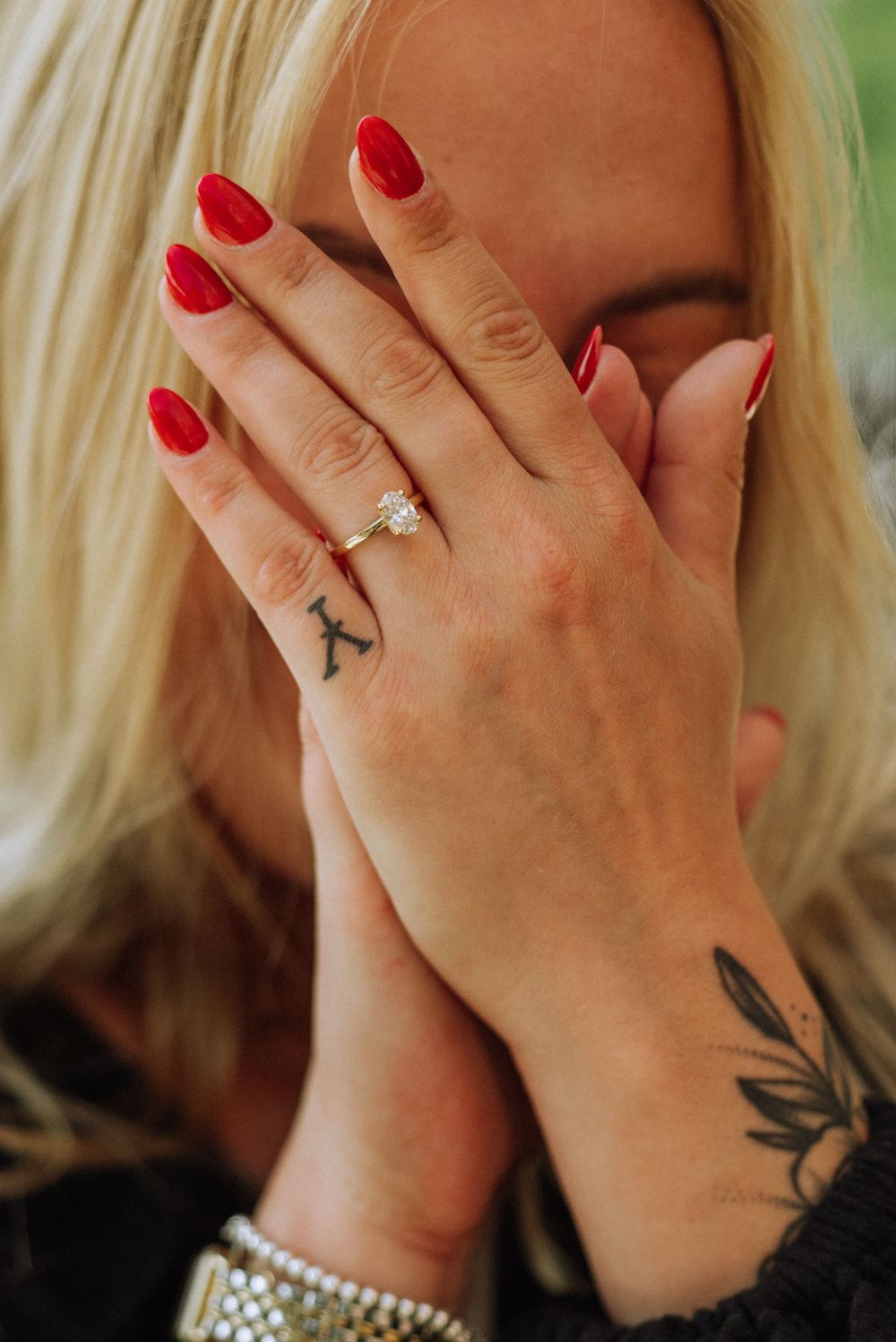 Sequence of photos showing hands with red nail polish and a ring covering someone's face in a facepalm gesture.