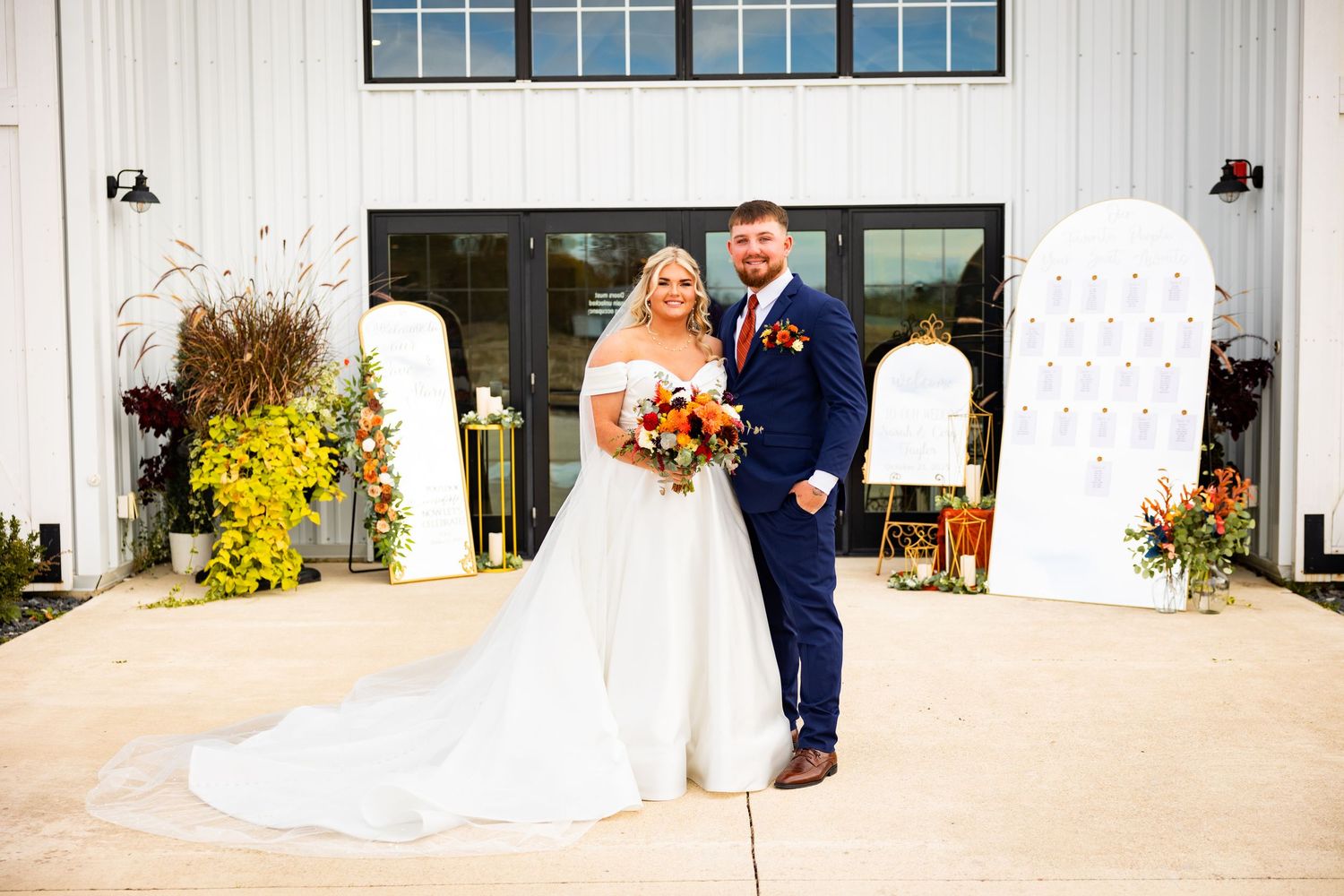 A wedding celebration sequence showing a couple in formal attire walking and posing at a bright modern venue.