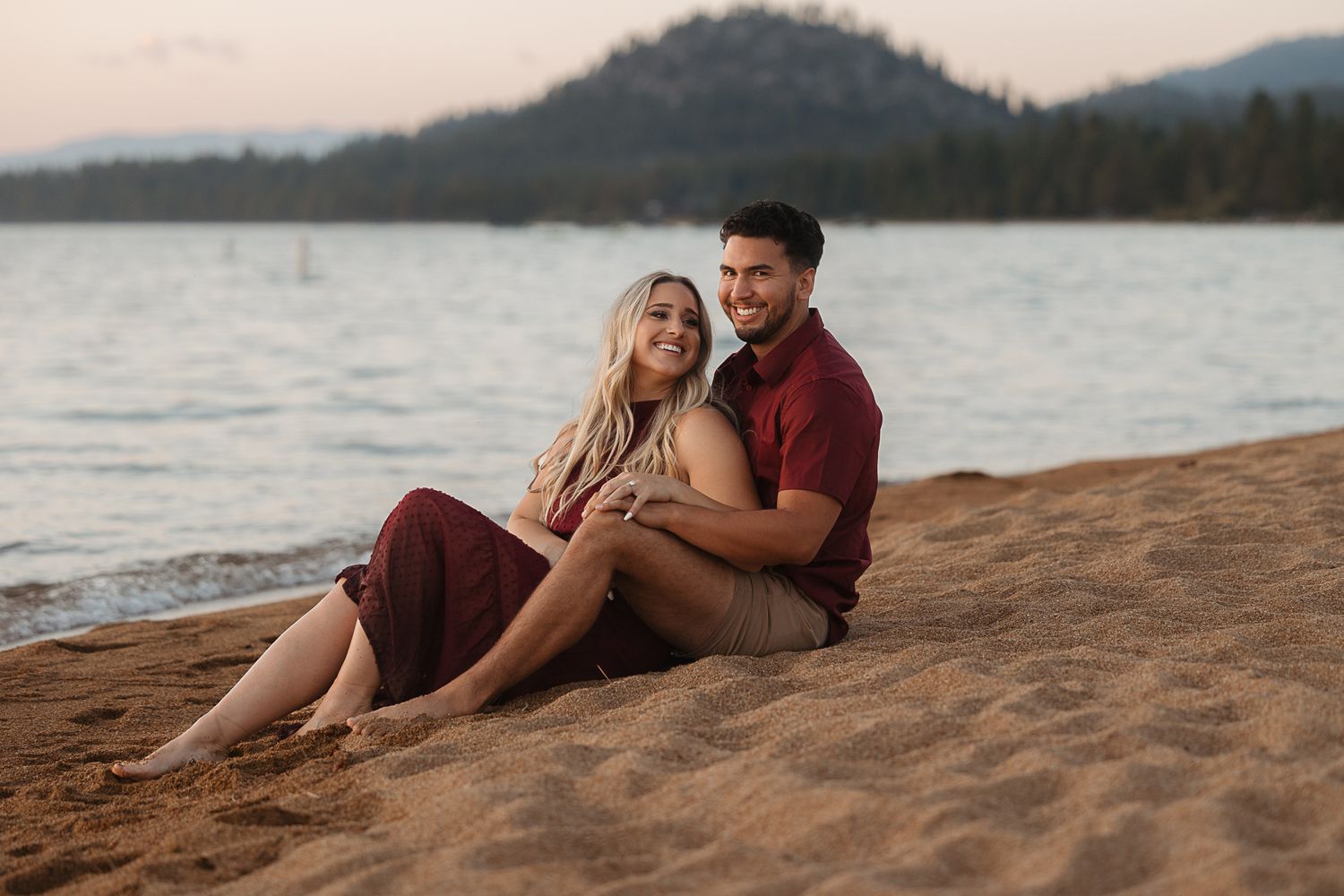 Intimate couple portraits taken along a desert road with mountain views.