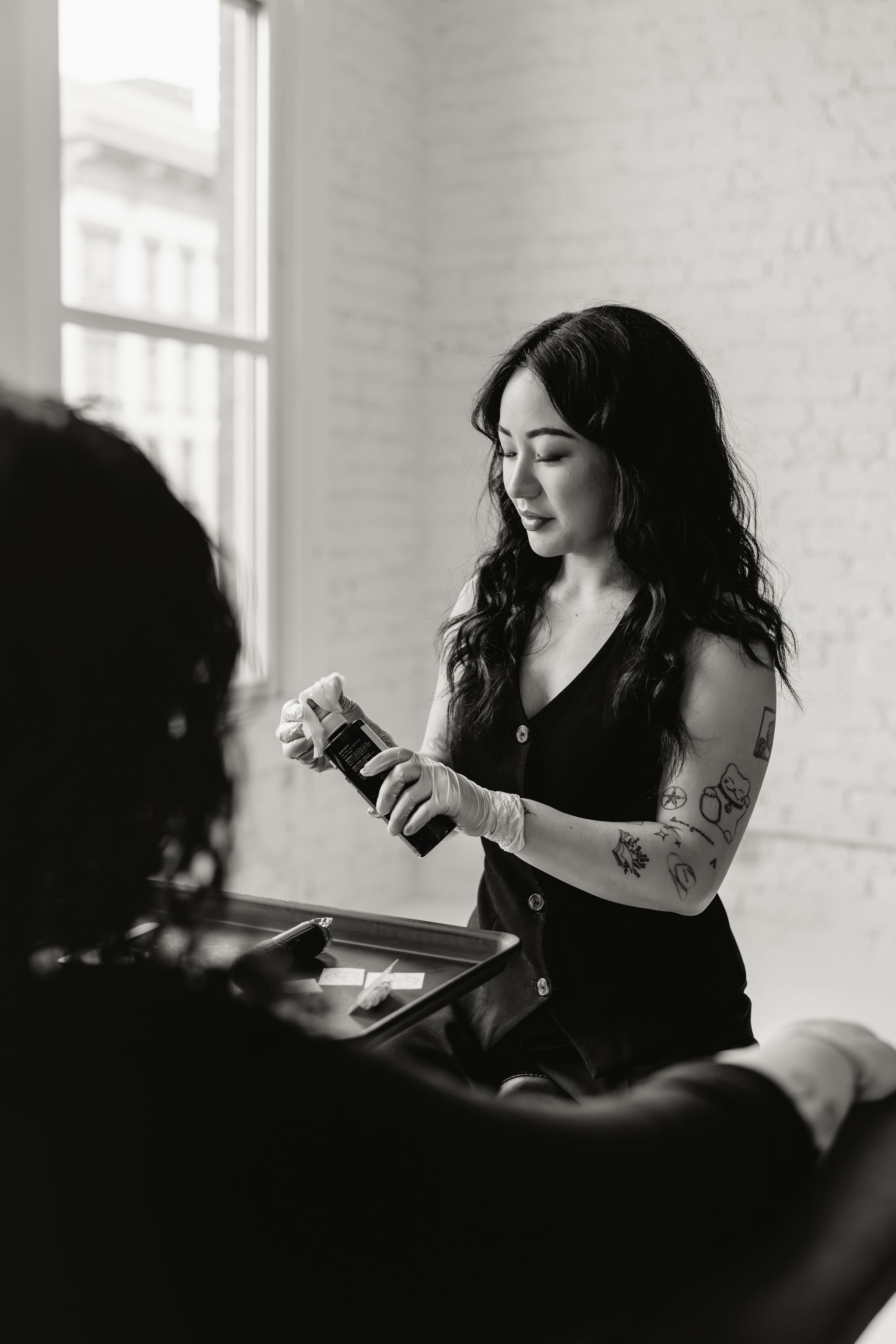 Black and white artistic photo series showing someone drinking coffee in a bright minimalist space.