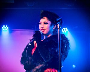 drag queen talks to crowd