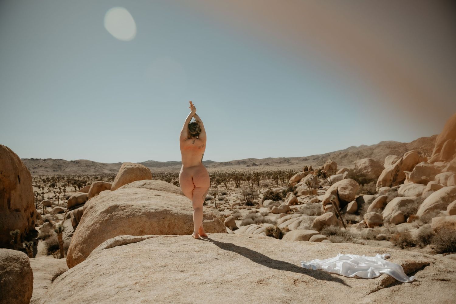 Outdoor Boudoir photography image in Joshua Tree National Park California. Stylized shoot that Jeslie from Utah participated in.