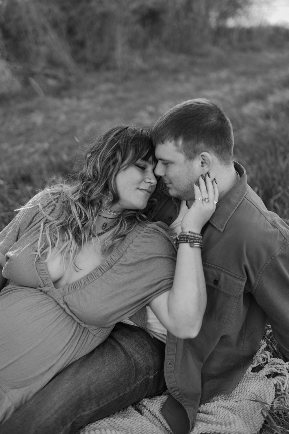 Black and white intimate portrait of couple sharing tender moment during maternity photoshoot. Virginia/ North Carolina Maternity Session
