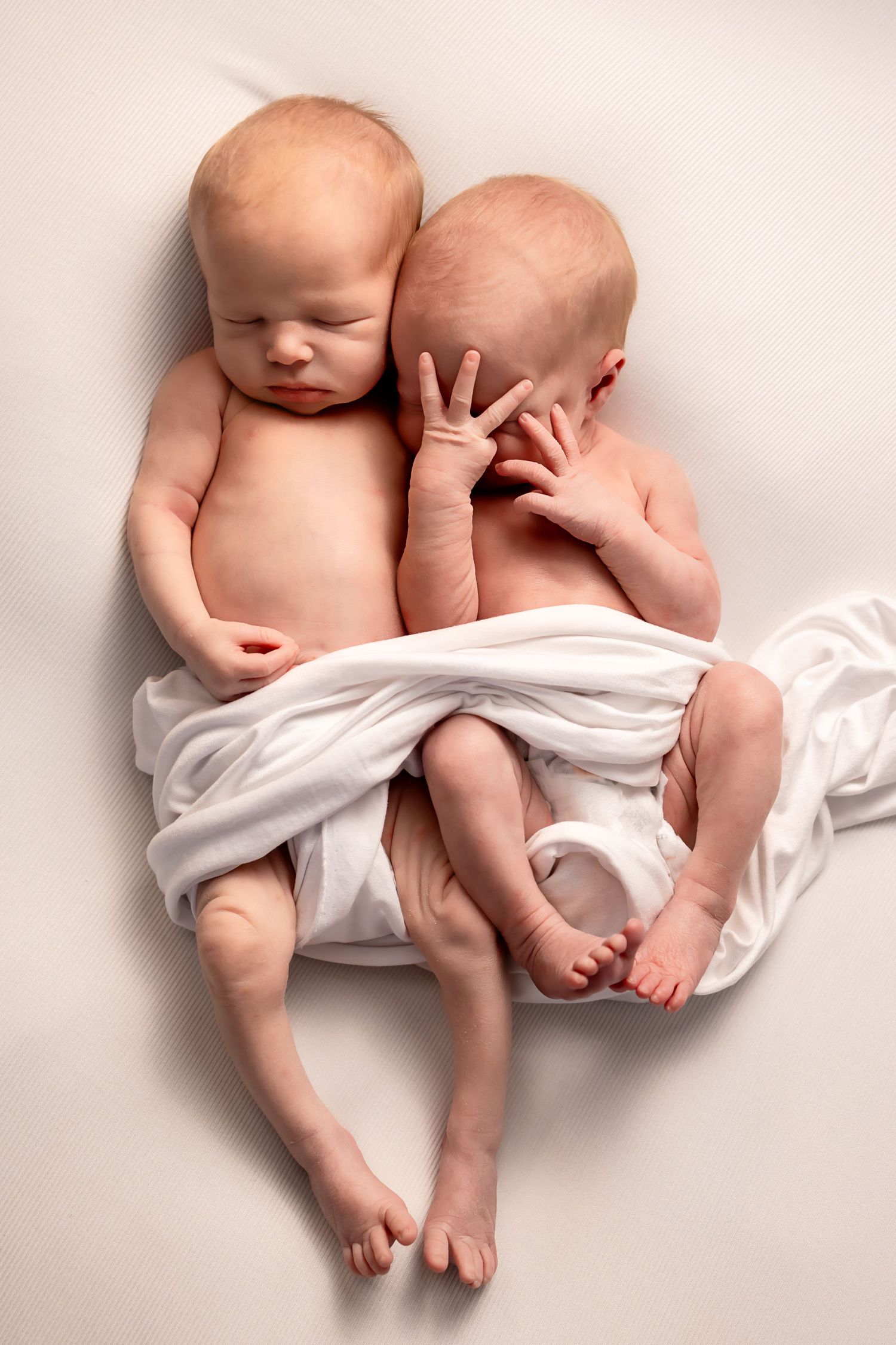 Maternity and newborn photographer in Richmond Virginia offering affordable sessions in studio, outdoors, and in your home.