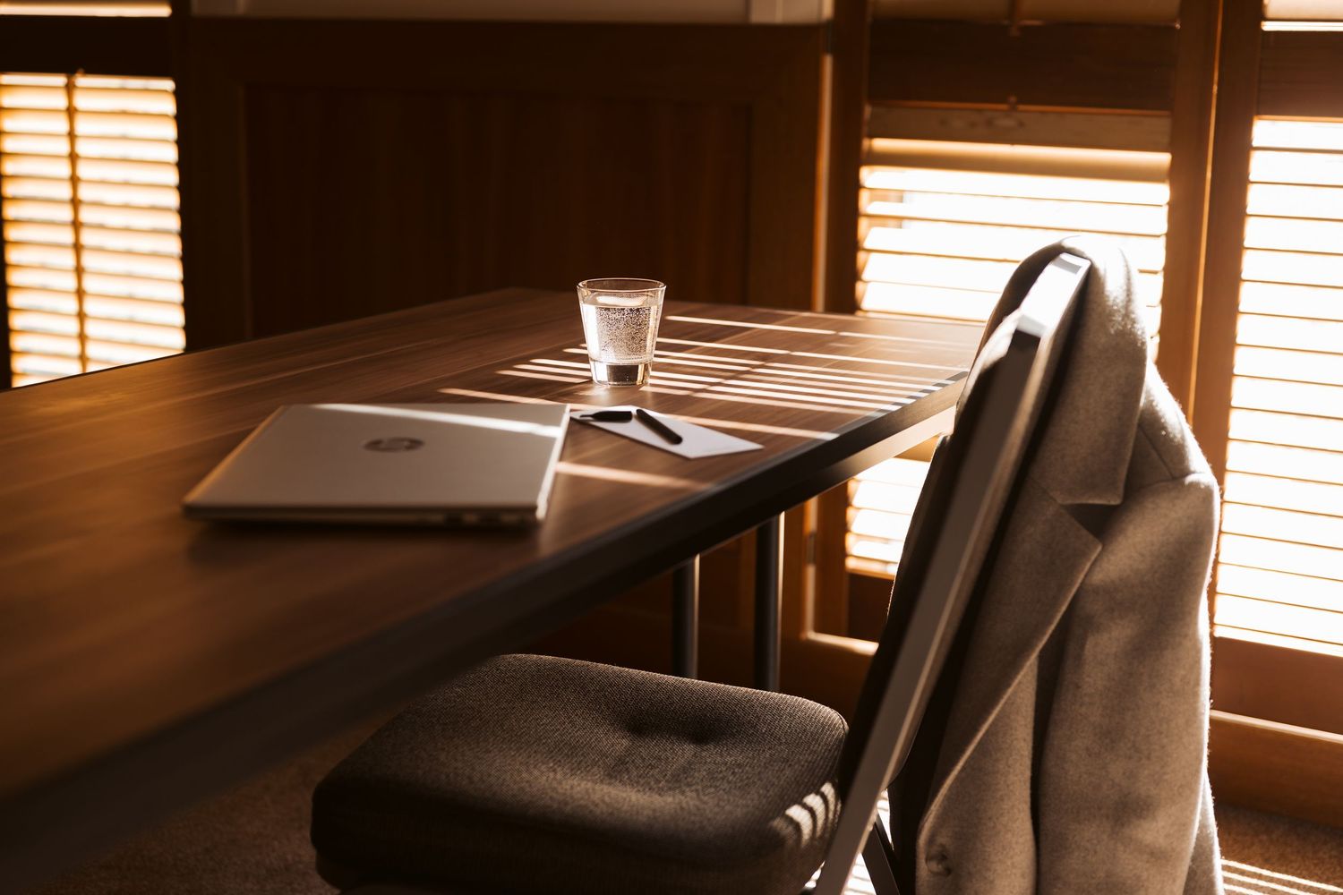 Commercial interior photography featuring warm natural light, timber finishes and modern workspace styling