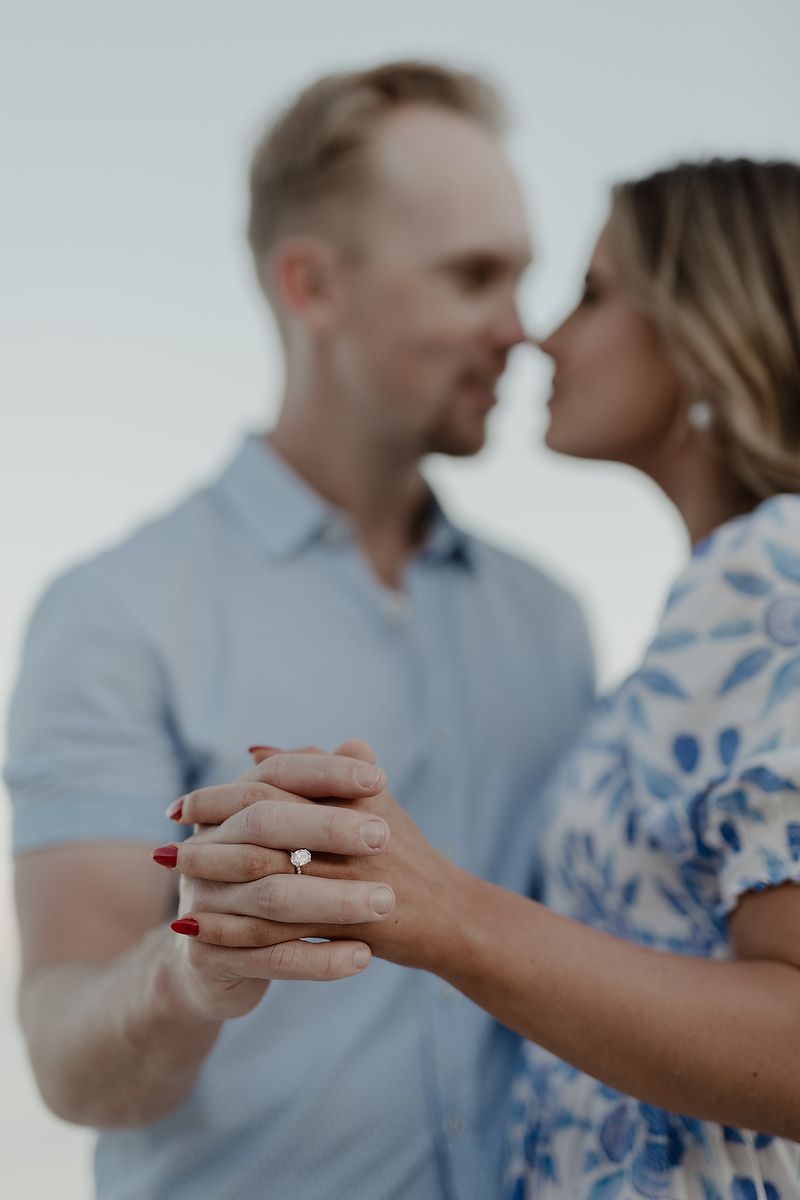 Close-up editorial engagement portrait of a couple about to kiss in Playa del Carmen.