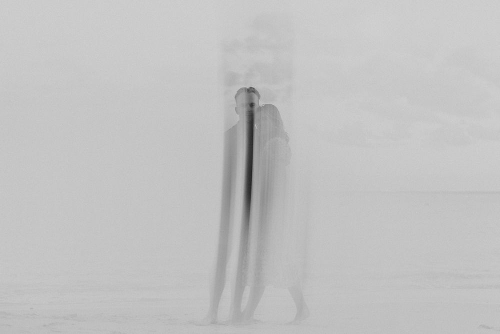 Creative editorial engagement photo with motion blur on the shore in Playa del Carmen.