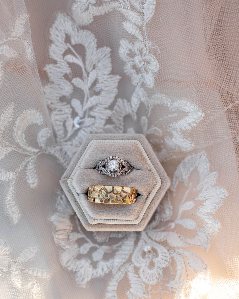 A wedding detail of the bride and groom's rings, photographed by AJ Herron Photography for a timeless keepsake