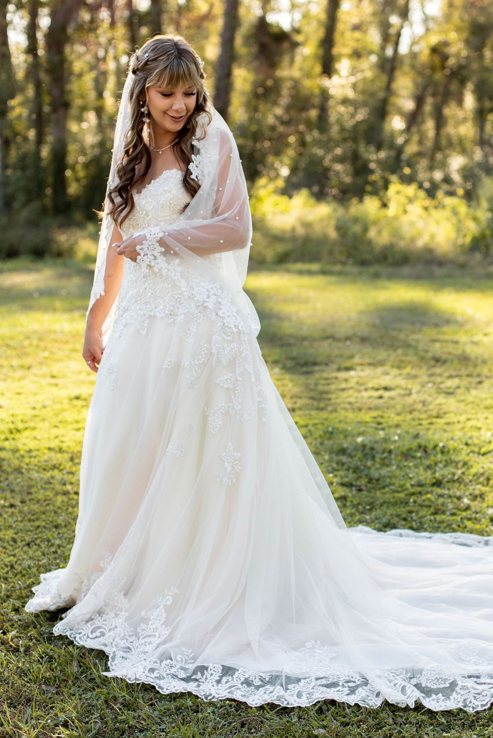 Dramatic bridal moment being photographed by AJ Herron Photography in this back yard wedding located in Live Oak, Florida.