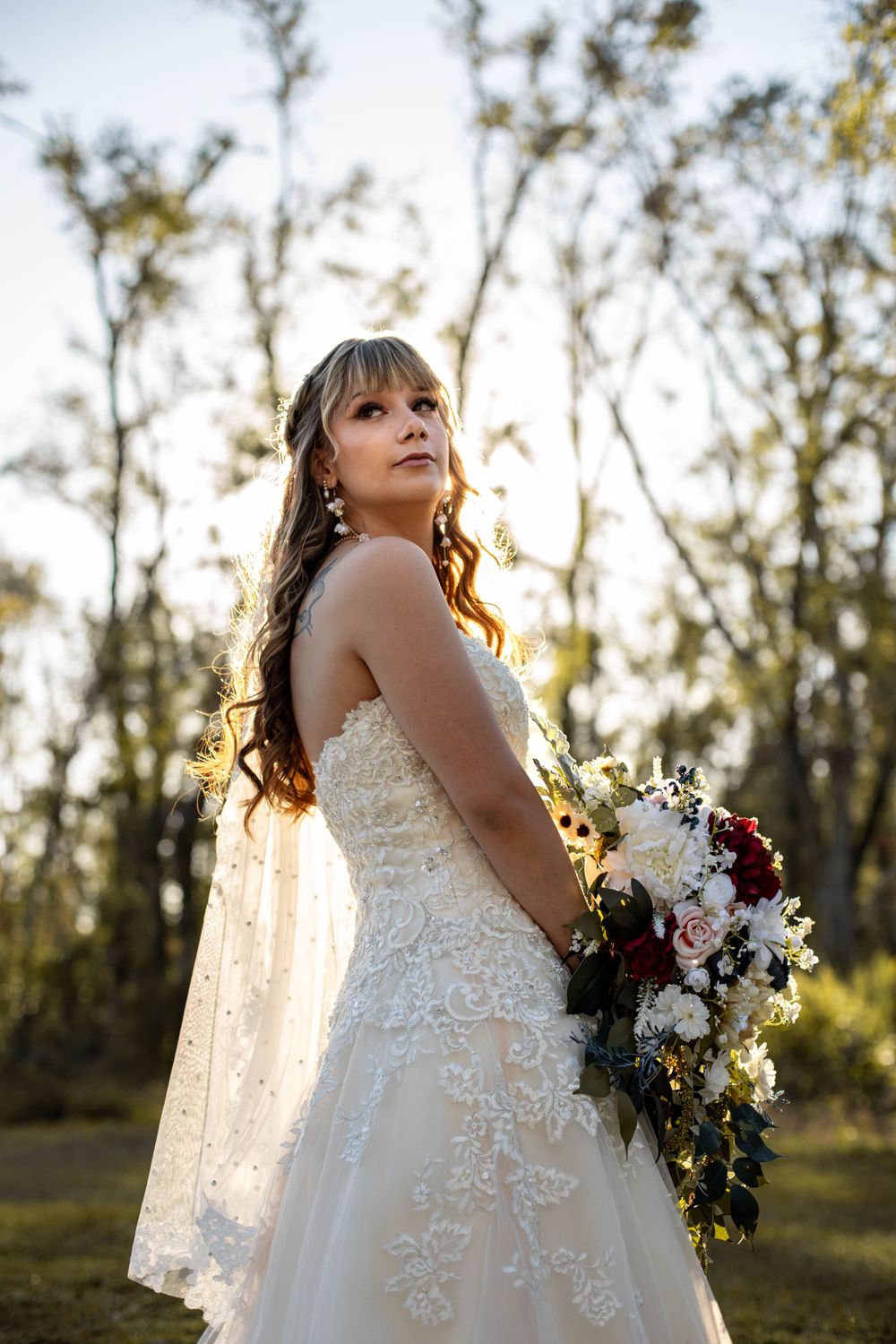 Dramatic bridal moment being photographed by AJ Herron Photography in this back yard wedding located in Live Oak, Florida.