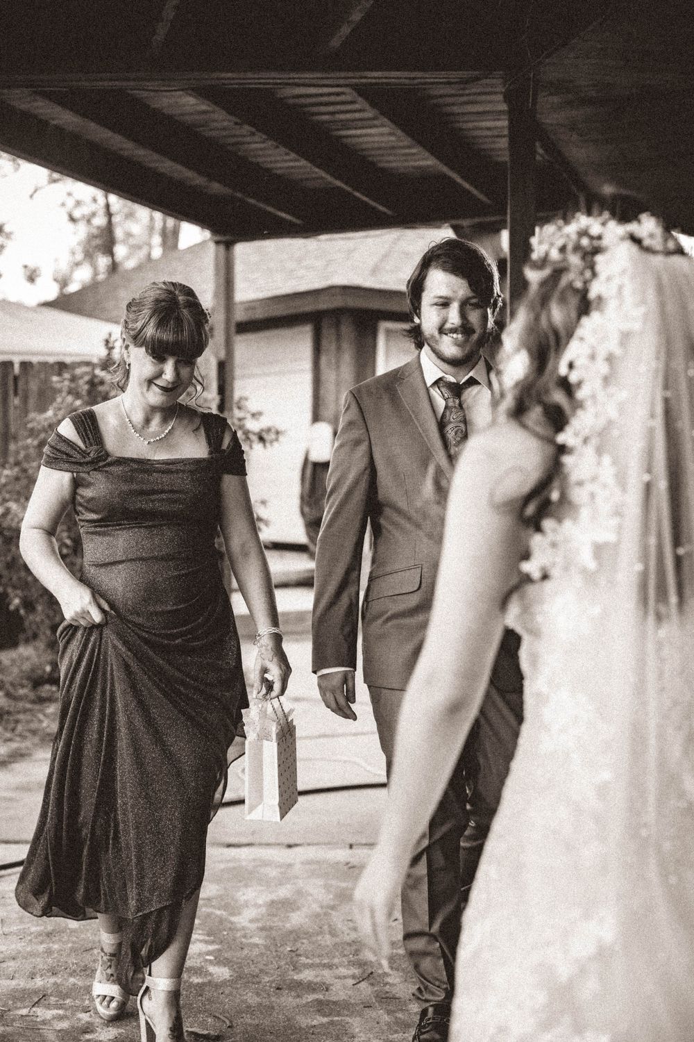 A first look of the bride with mom and brother, such a sweet moment photographed by a Live Oak, FL photographer, AJ Herron Photography.