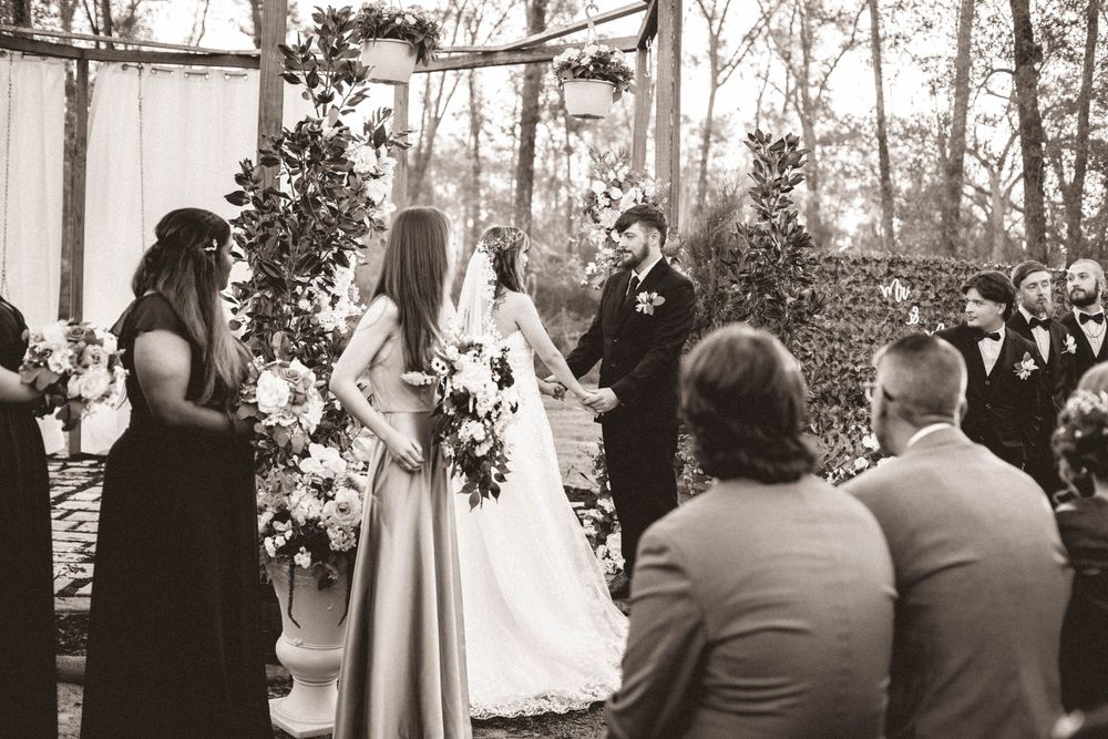 Beautiful backyard wedding ceremony in Live Oak, Florida. Photographed by AJ Herron Photography