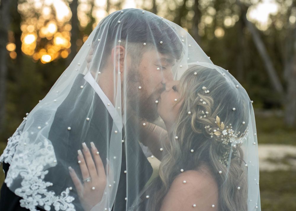 Sharing this special moment together as husband and wife. Photographed by AJ Herron Photography in O'Brien, Florida.