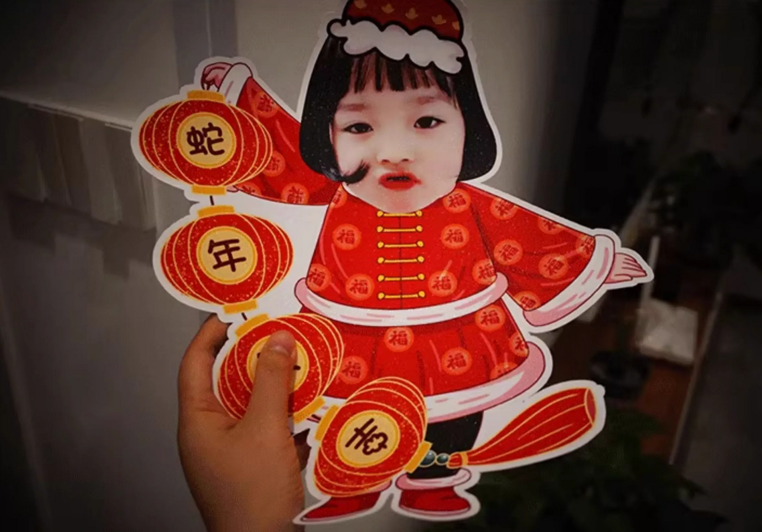 Red and gold Chinese New Year decorations with traditional festive elements.
