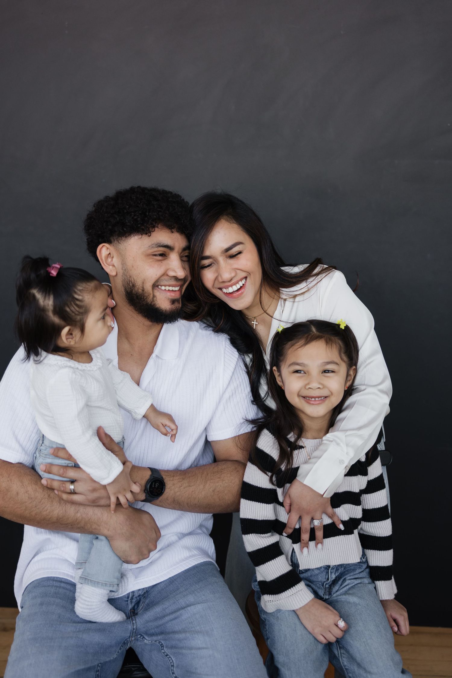 Candid beautiful casual studio family photo session with toddler, stress free.