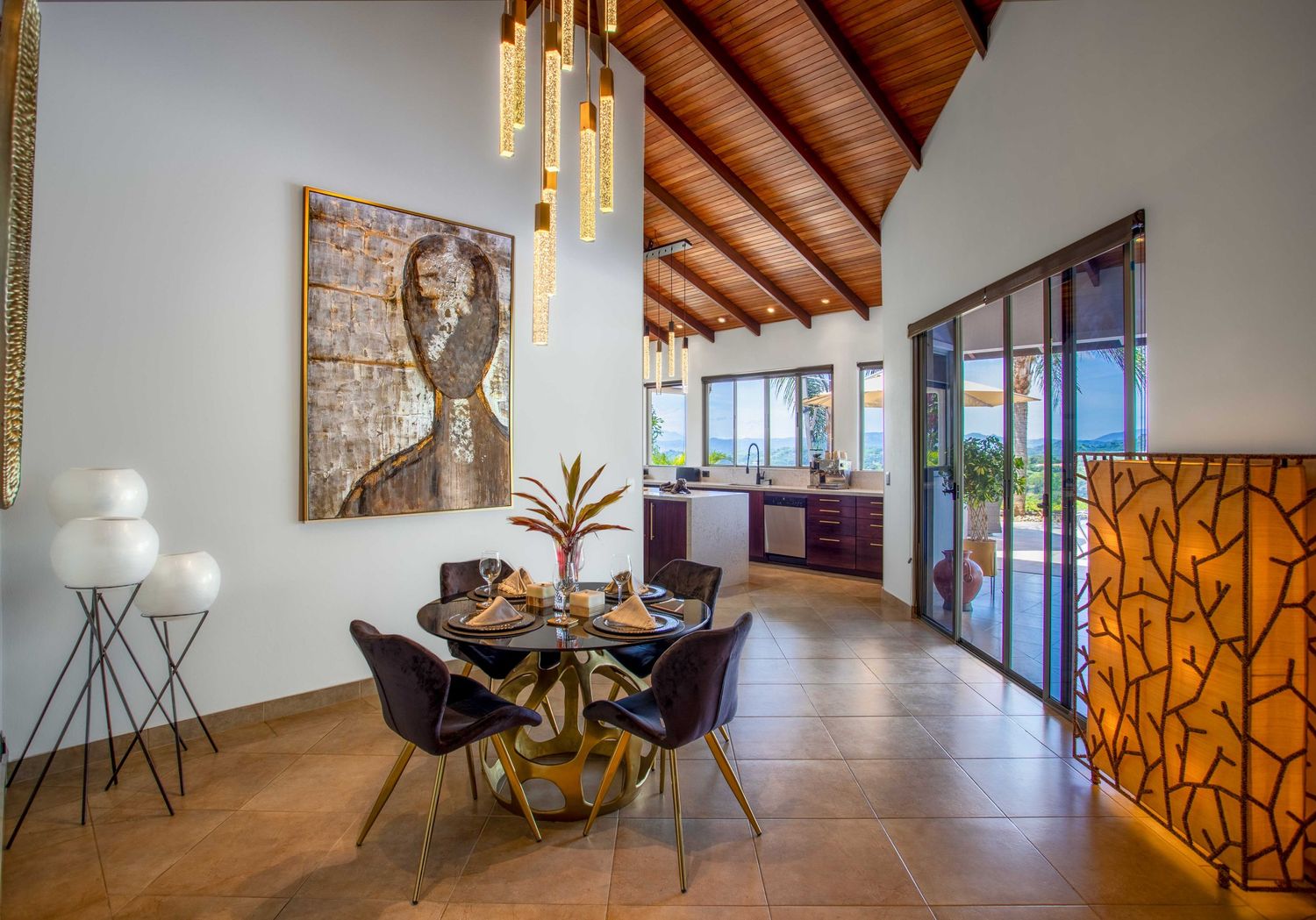 Elegant outdoor dining area with modern furniture and breathtaking views of the Costa Rican jungle