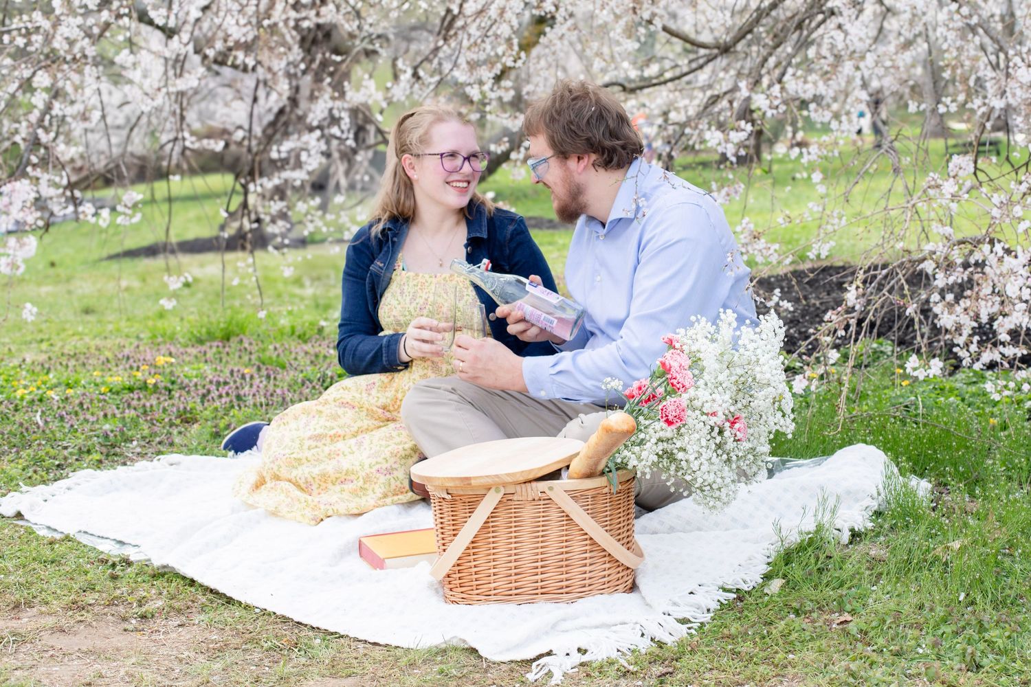 Husband and wife cherry blossom portrait in Cincinnati capturing elegant, high-end couple photography for premium clients