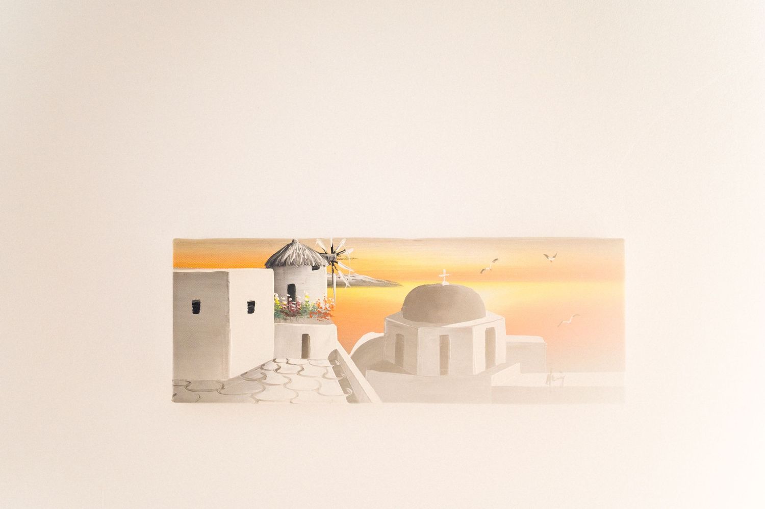 Minimalist watercolor painting of white Mediterranean buildings with domed roofs against a warm orange sunset sky.