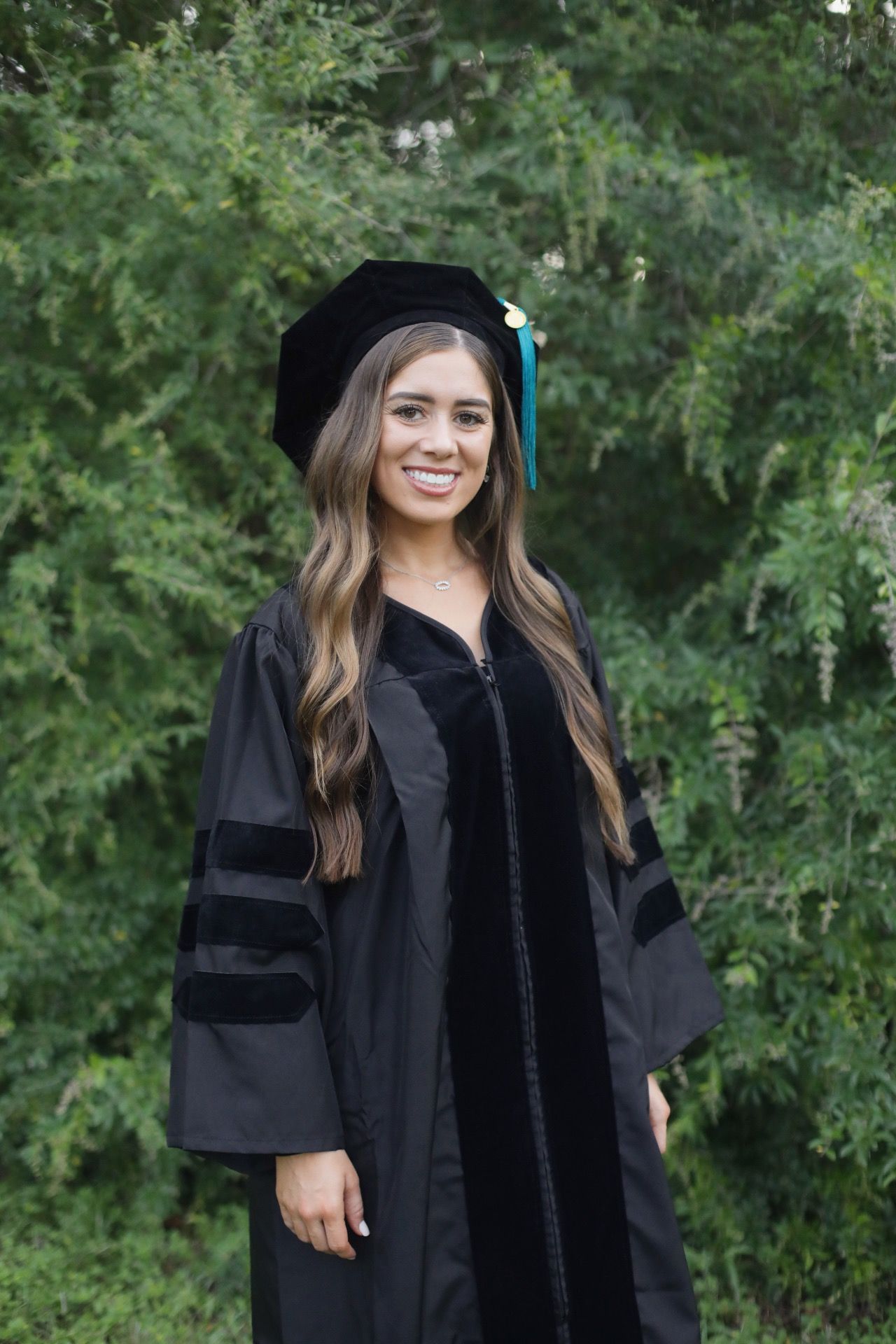 Graduate student posing during a photoshoot.