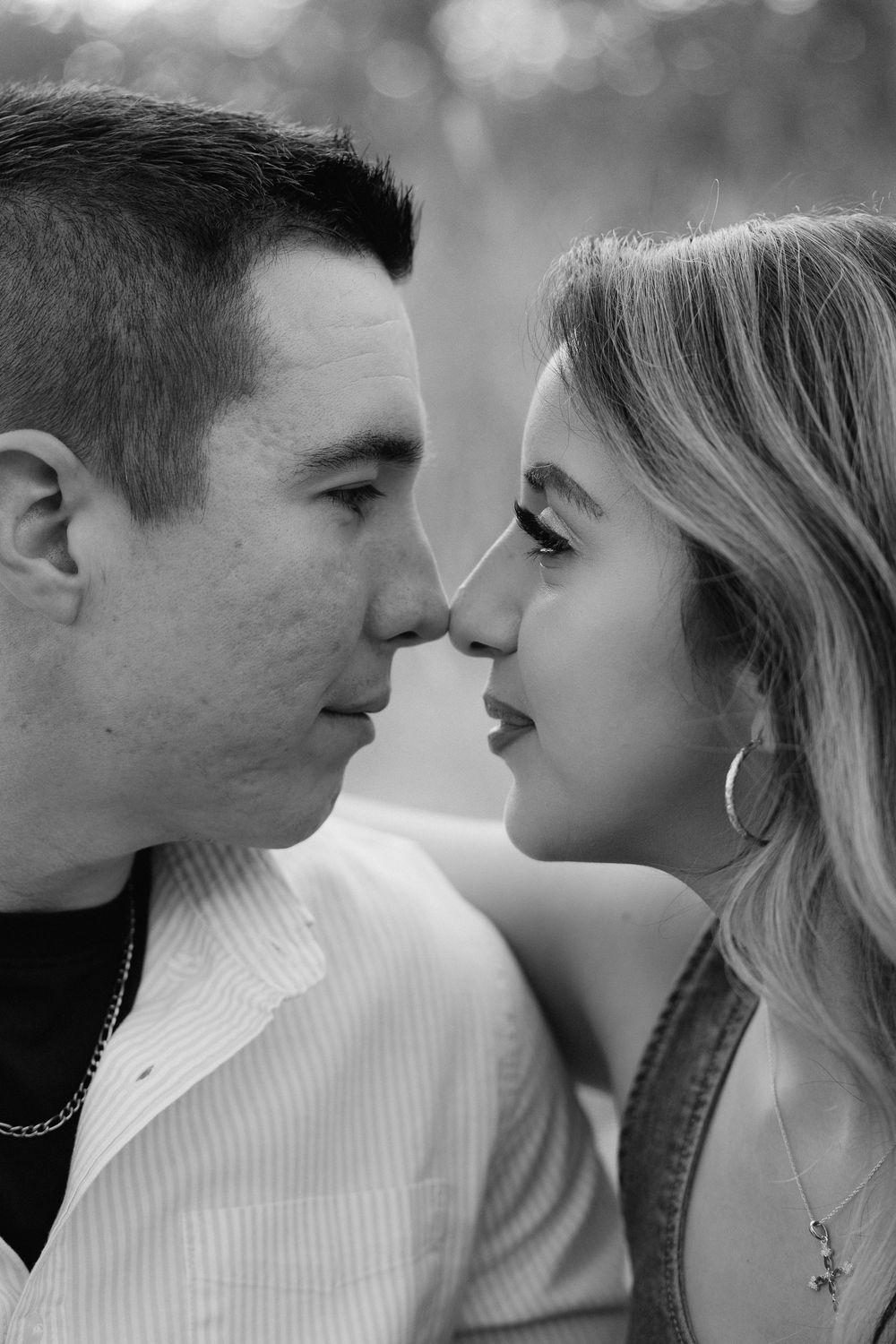 A romantic black and white photo series showing close-up profiles of a couple about to kiss.