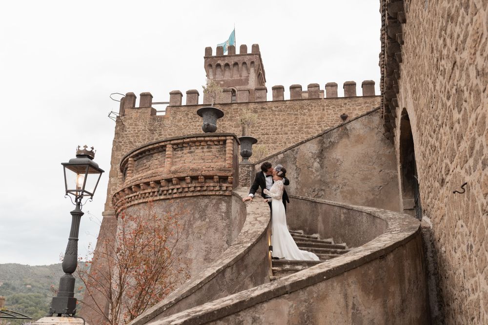 Ancient stone castle walls and battlements photographed during a wedding event.