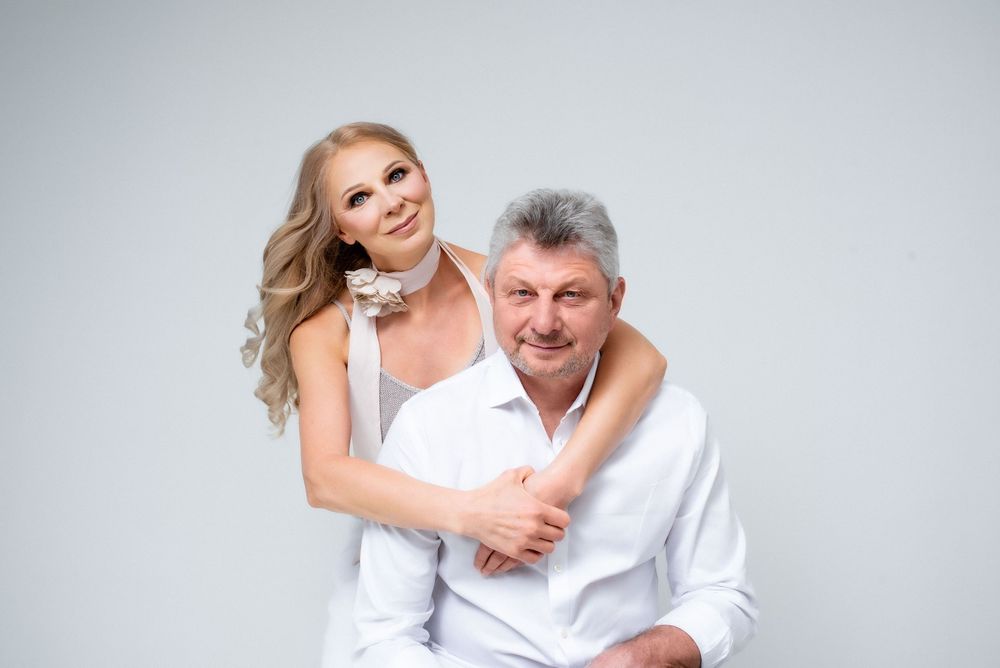 Elegant studio portrait of a couple.
