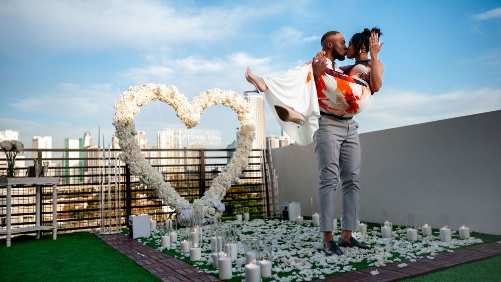 Surprise proposal on a rooftop in Miami. Captured by Miami luxury wedding photographers