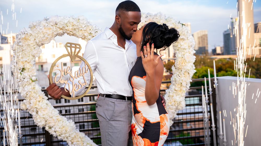 Surprise proposal on a rooftop in Miami. Luxury engagement photography.