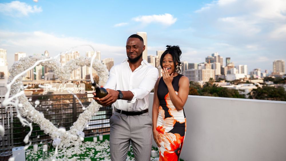 Romantic rooftop proposal in Miami captured by top Miami proposal photographers at sunset