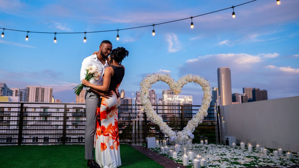 Surprise proposal on a rooftop in Miami.
