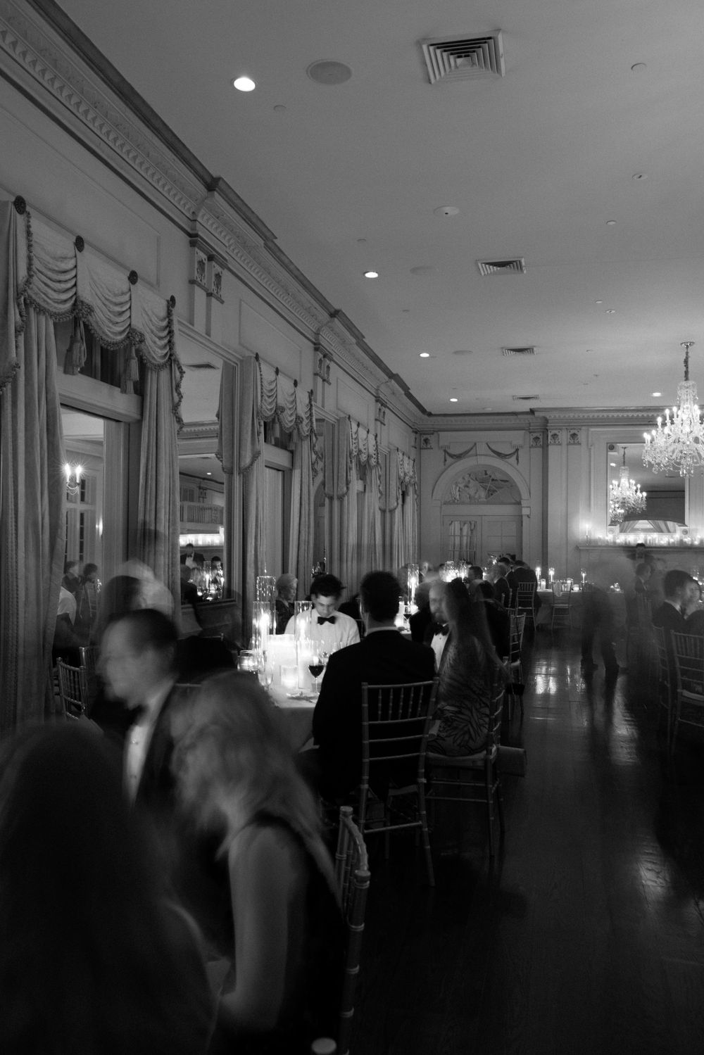 Elegant ballroom interior with chandeliers and classic architectural details shown in multiple views.