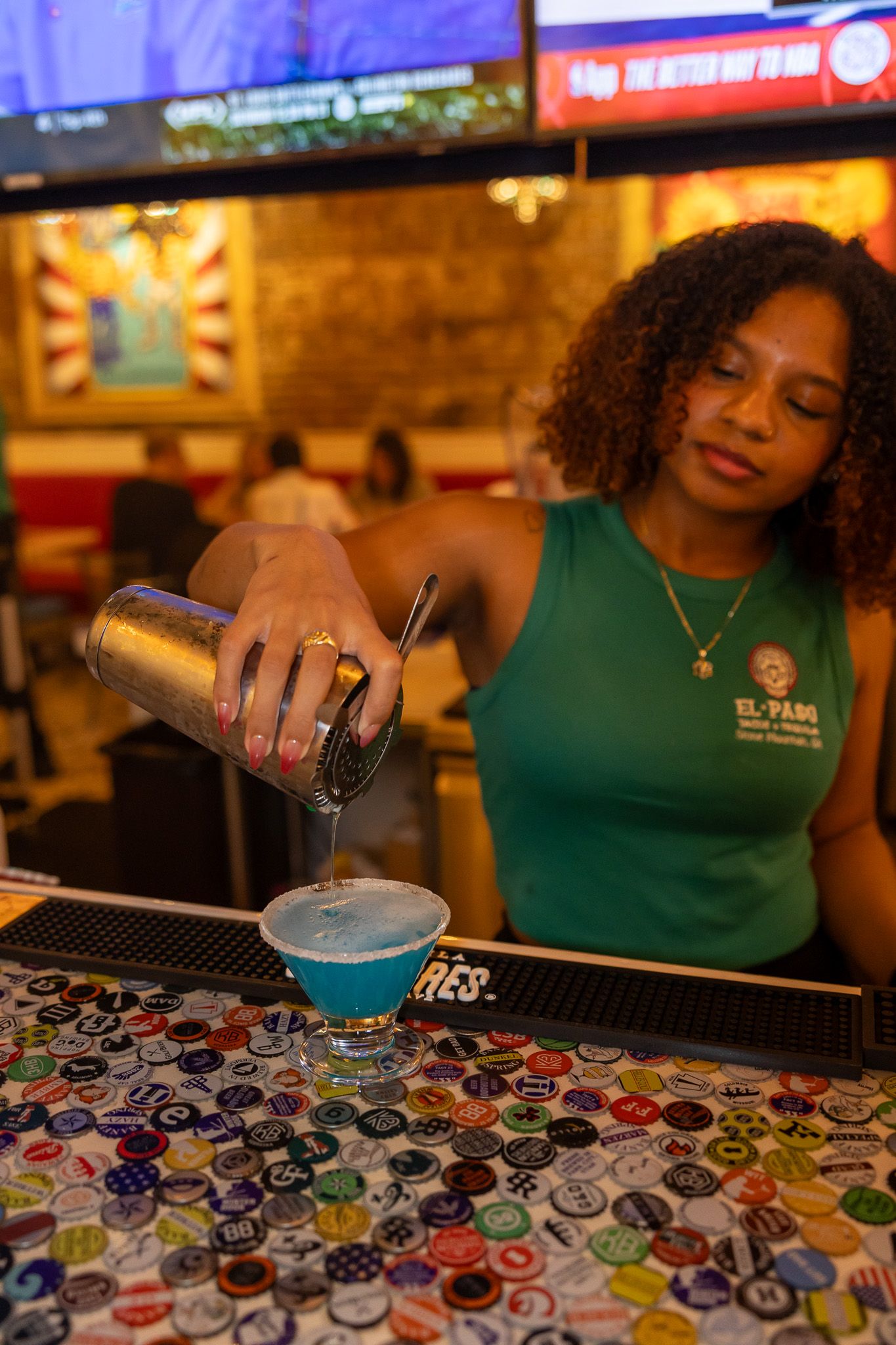 Asheville small business entrepreneur and local restaurant bar posing during a professional branding photography session