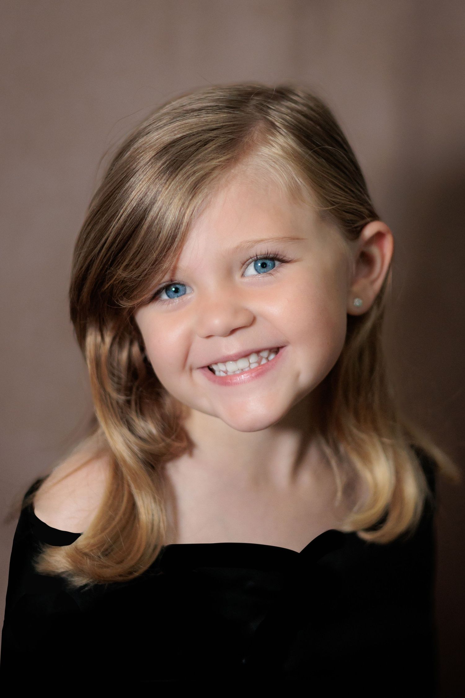 Portrait series showing expressive close-up shots against brown background.