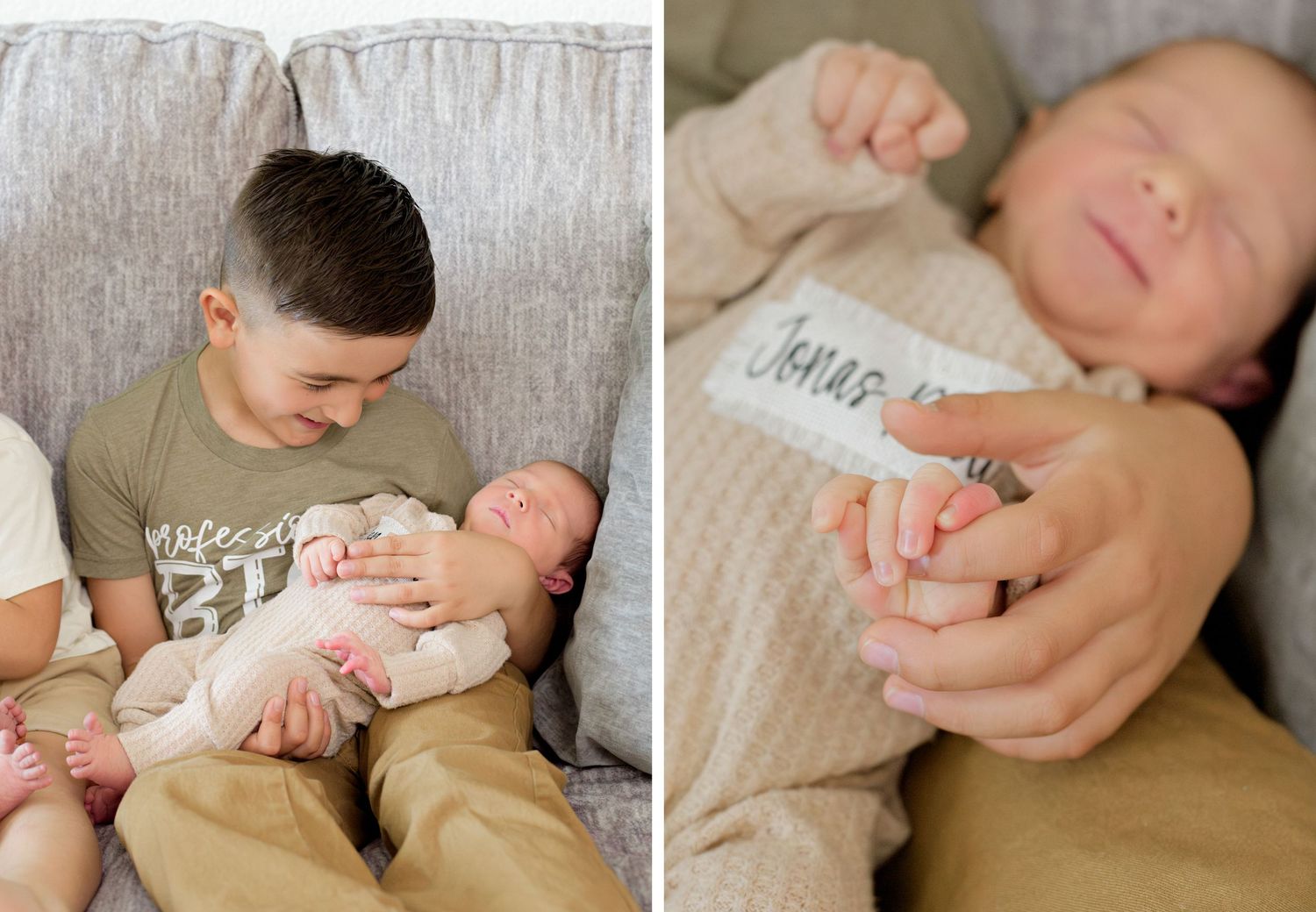 Sibling bonding moment on couch as older child gently holds sleeping infant wearing light colored onesie.