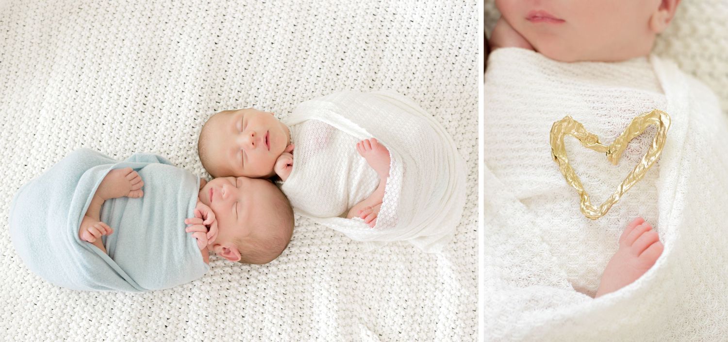 Soft pastel image showcasing a tranquil sleeping newborn swaddled in blue beside a delicate heart pattern detail.