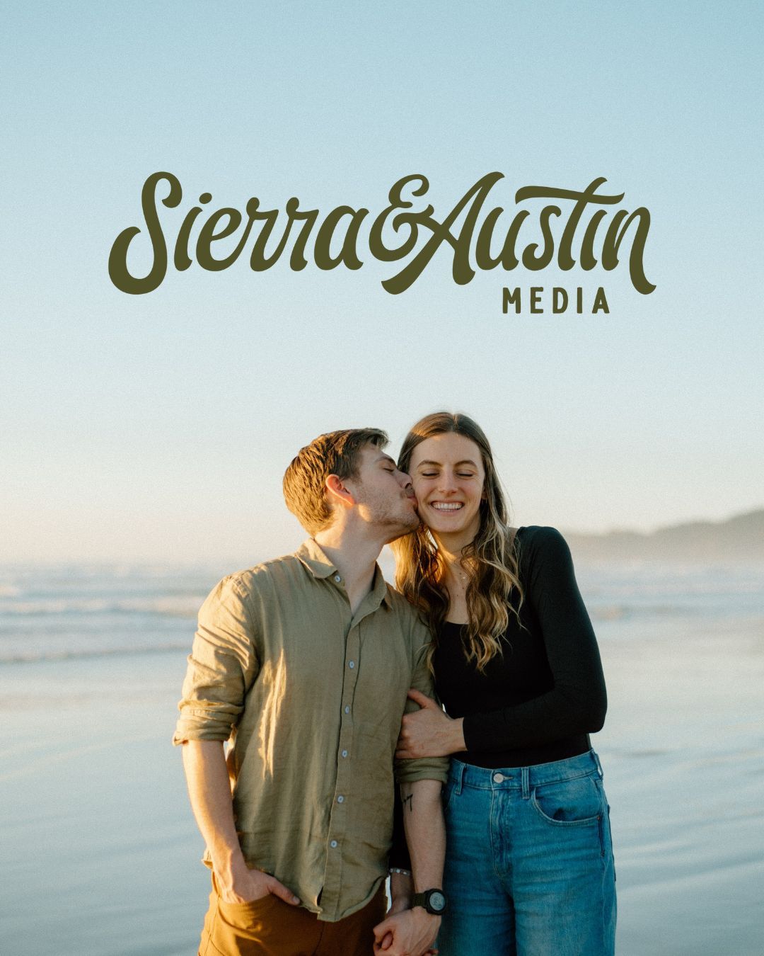 A couple embraces in warm golden sunlight on a peaceful beach with Sierra&Austin Media logo overlay.